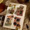 A close-up of a page from a decorative washi tape product showing various patterned paper samples and craft elements.