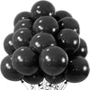 A cluster of black latex balloons tied together for a party or celebration