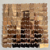 A grid of square iridescent gold and bronze sequin shimmer wall panels for a sparkling backdrop.