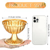 A gold trumpet vase is shown next to a smartphone to illustrate its size.
