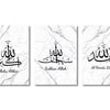 Set of three Islamic calligraphy art prints on white marble background featuring phrases like Allah Akbar, Subhan Allah, and 