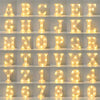 A display of illuminated LED letter lights in various uppercase and lowercase alphabets and numbers.