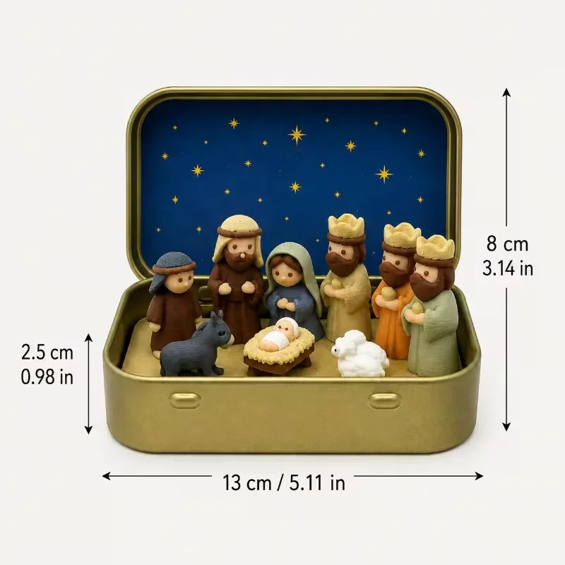 A small nativity scene featuring figures of Mary Joseph and baby Jesus set in a gold-colored metal box with a blue starry bac