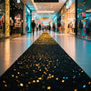 An elegant white sparkling aisle runner lights a modern retail store walkway with warm lighting.