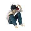 PVC figure of Death Note character Light with a red orb, dressed in light blue pants.