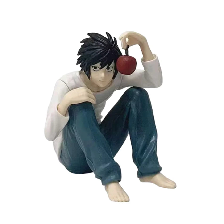 PVC figure of Death Note character Light with a red orb, dressed in light blue pants.