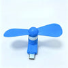 A blue portable USB-C mini fan with soft blades shown against a white background.