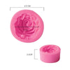 Pink silicone mold shaped like a rose flower for cake decorating