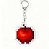 A red apple acrylic keychain charm with a silver split ring.