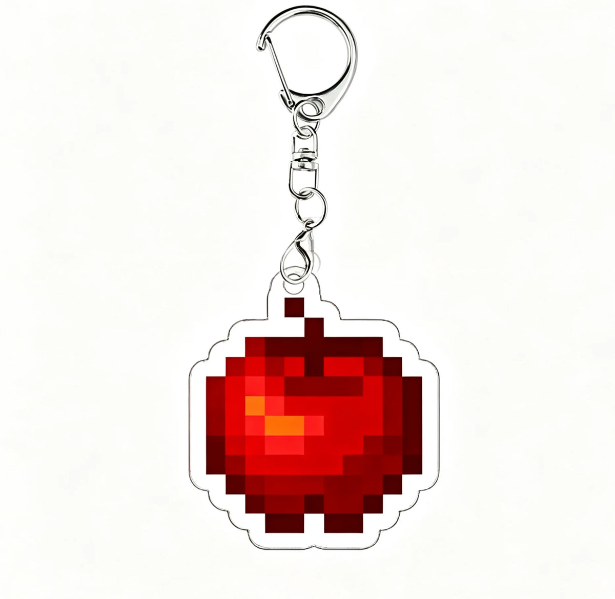 A red apple acrylic keychain charm with a silver split ring.