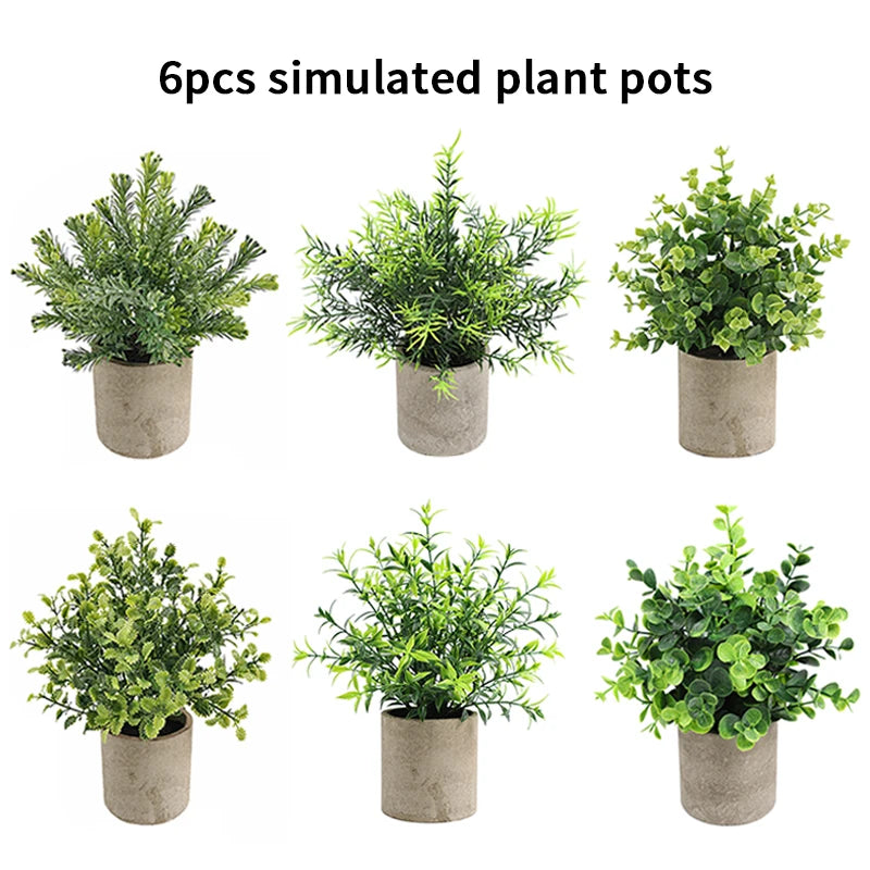 Six simulated potted plants in various shades of green displayed in rustic gray pots.