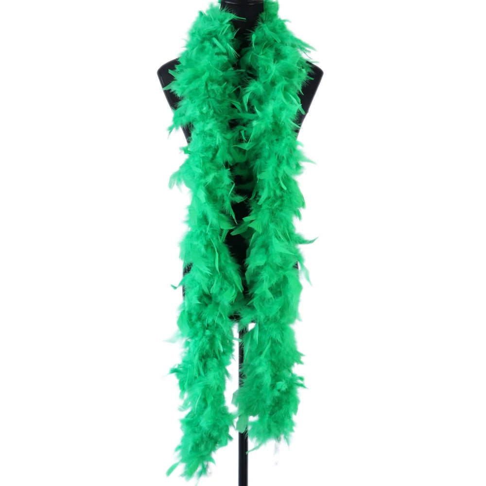 A bright green natural turkey feather boa displayed on a black hanger.