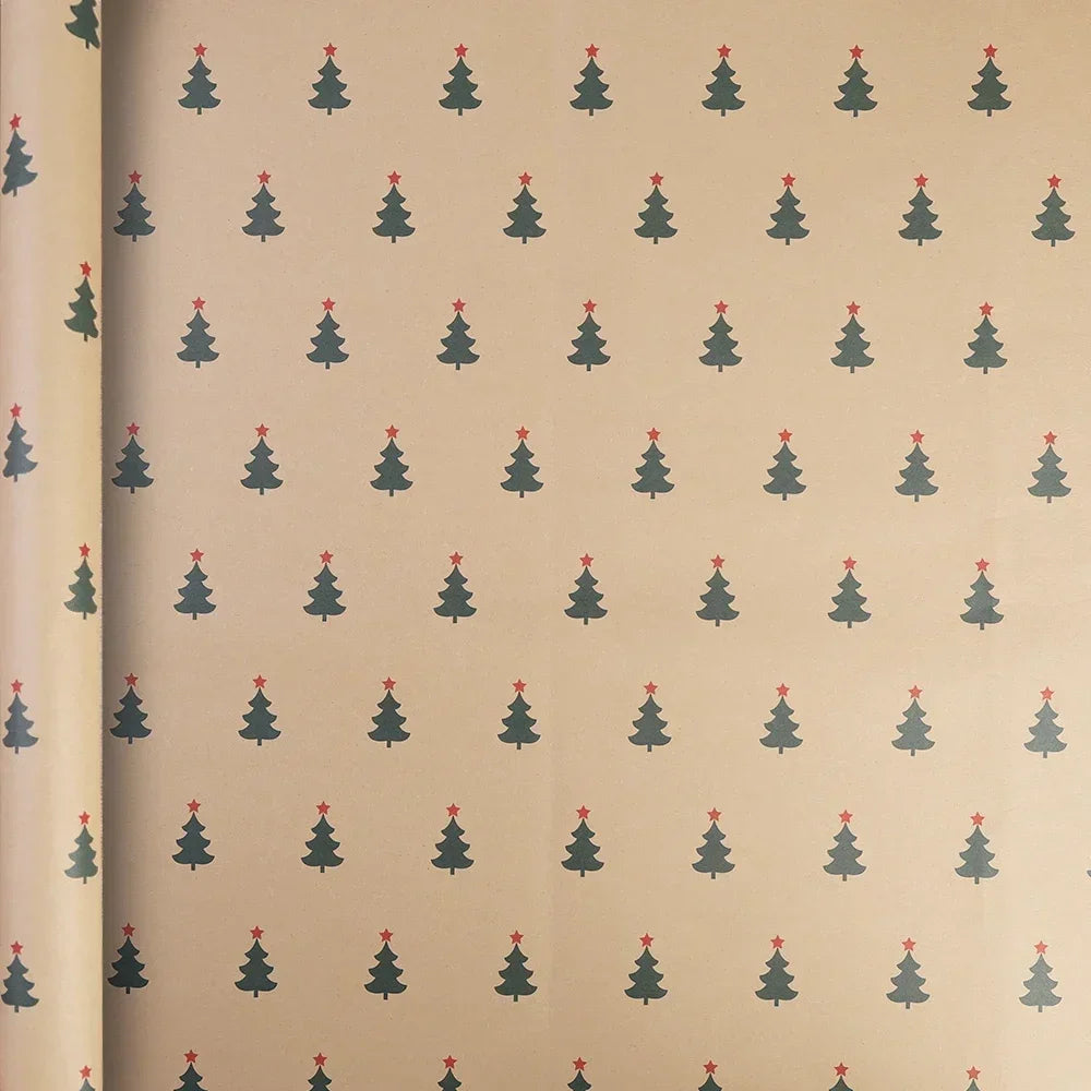 A roll of festive Christmas kraft wrapping paper featuring a repeating pattern of small green pine trees on a beige backgroun