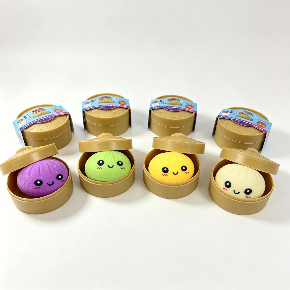 Five squishy toys shaped like dumplings in various colors including purple, green, yellow, and white.