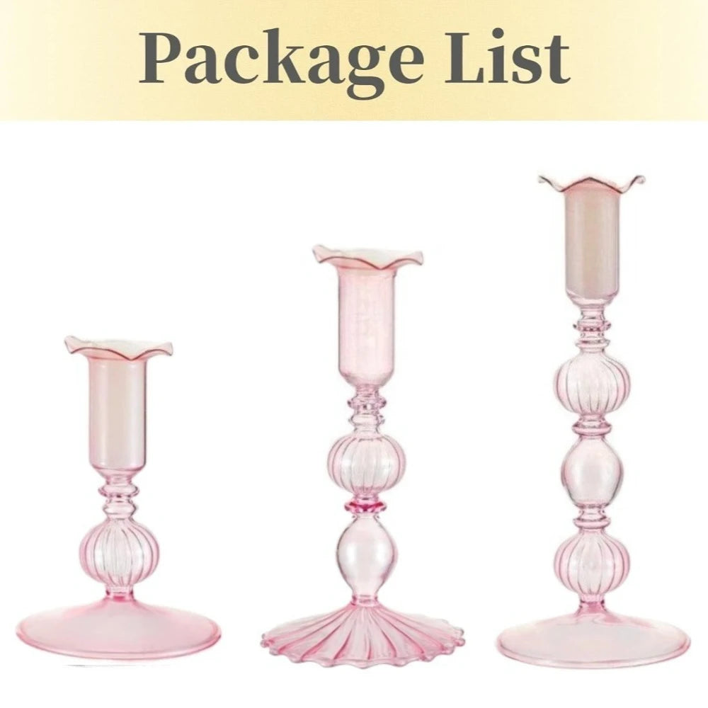 A set of three pink wavy glass taper candle holders displayed against a white background.