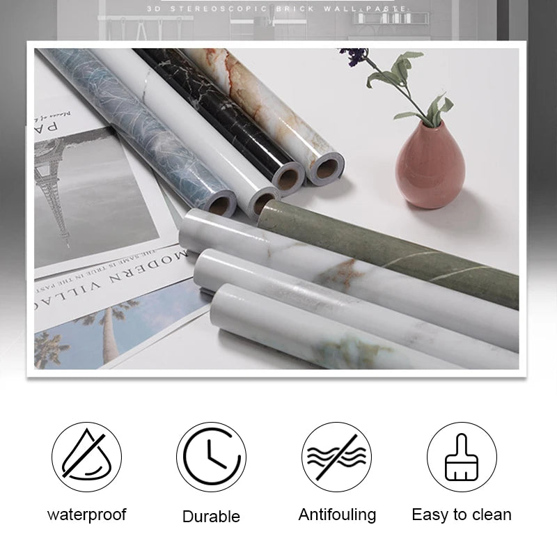 Rolls of self-adhesive marble contact paper in various shades and patterns for kitchen and bathroom decor