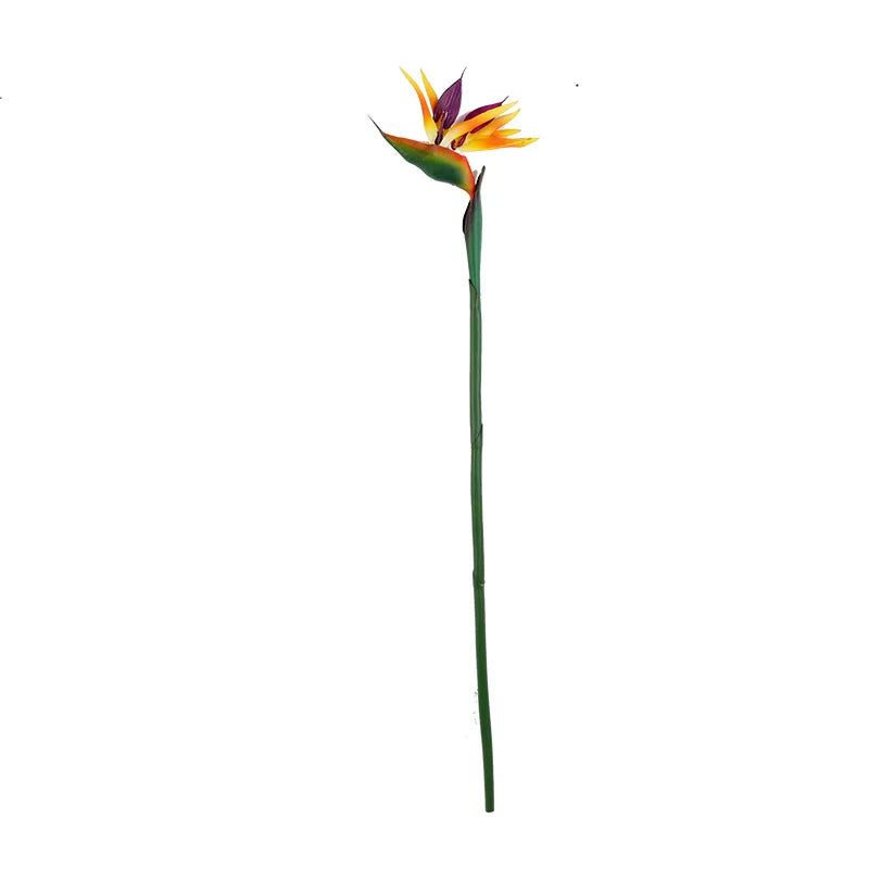 A vibrant artificial Bird of Paradise flower on a green stem.