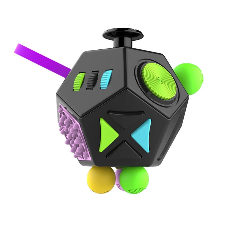 A black fidget cube with green and purple accents and colorful balls.
