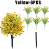 Yellow artificial flowers in six bunches on black stems for outdoor and indoor decoration