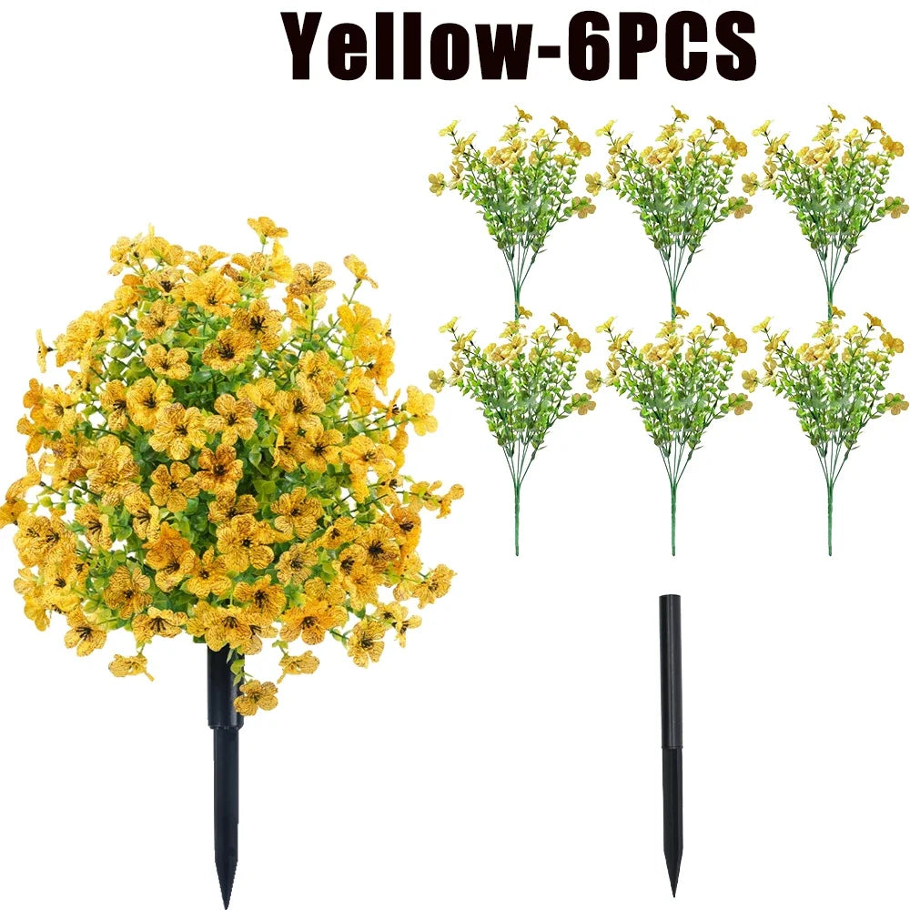 Yellow artificial flowers in six bunches on black stems for outdoor and indoor decoration