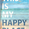 A weathered metal tin sign with the text THIS IS MY HAPPY PLACE painted in blue on a light blue background.