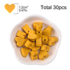 A pile of yellow silicone heart beads for DIY jewelry making, with a size reference and total count.