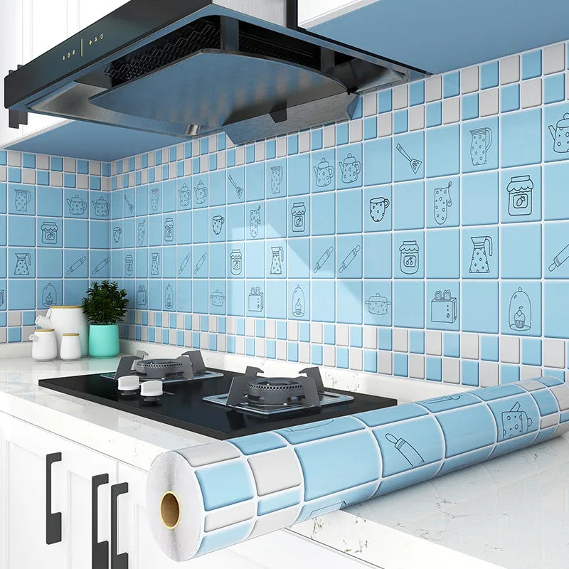 A blue and white tiled kitchen wall decorated with line art illustrations of cooking tools and ingredients, featuring a rolle