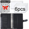 A set of stickers with a red bow and a black leather budget planner binder for cash envelopes and expense sheets