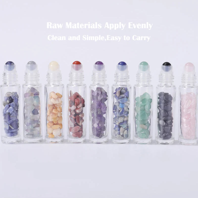 A set of ten glass roll-on bottles filled with various semi-precious stone roller balls in different colors and shades.