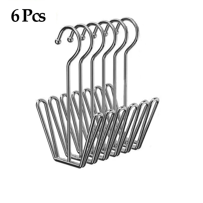 A set of six stainless steel hanging shoe organizers with double hooks.