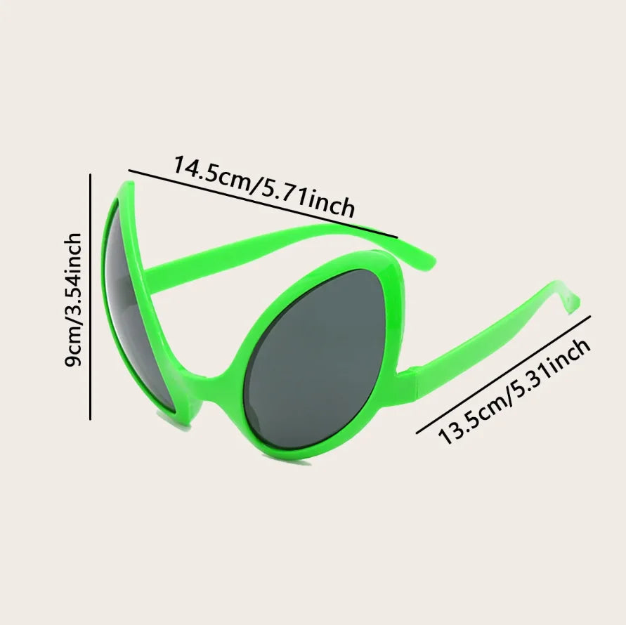 Green alien sunglasses with a quirky design shown from the side.
