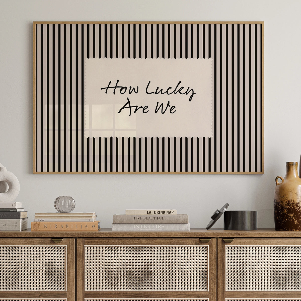 Black and white striped canvas wall art featuring the text How Lucky Are We