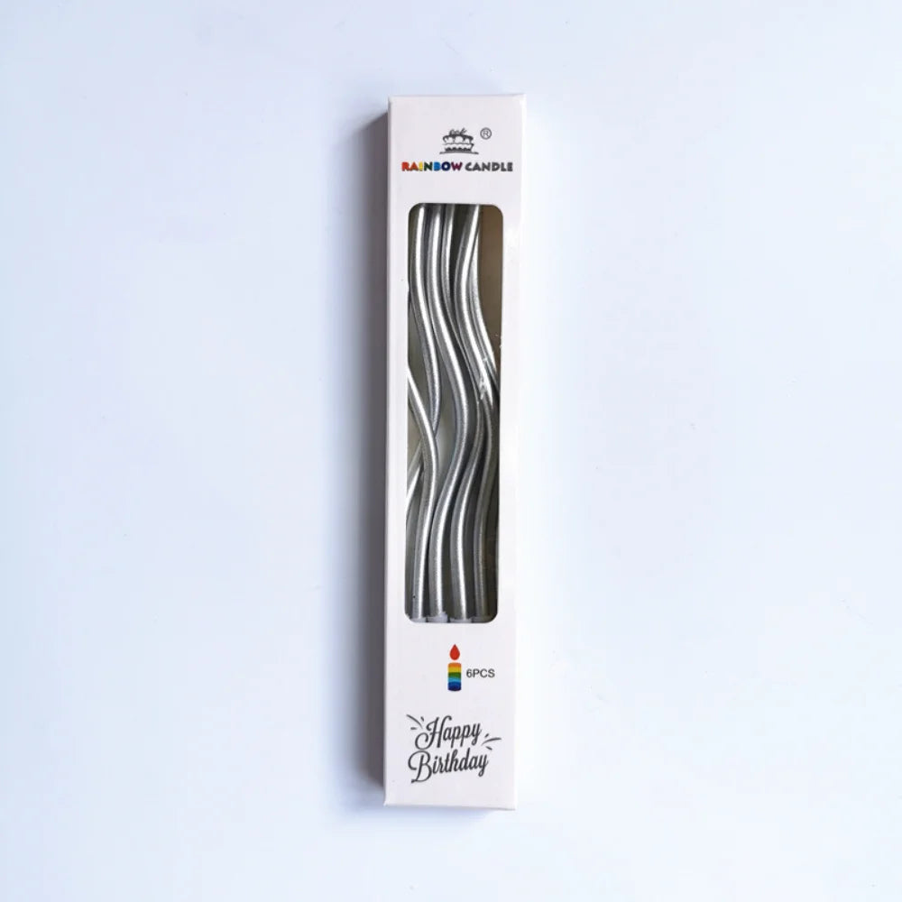 A vertical box for a set of six metallic twisted coil birthday candles.