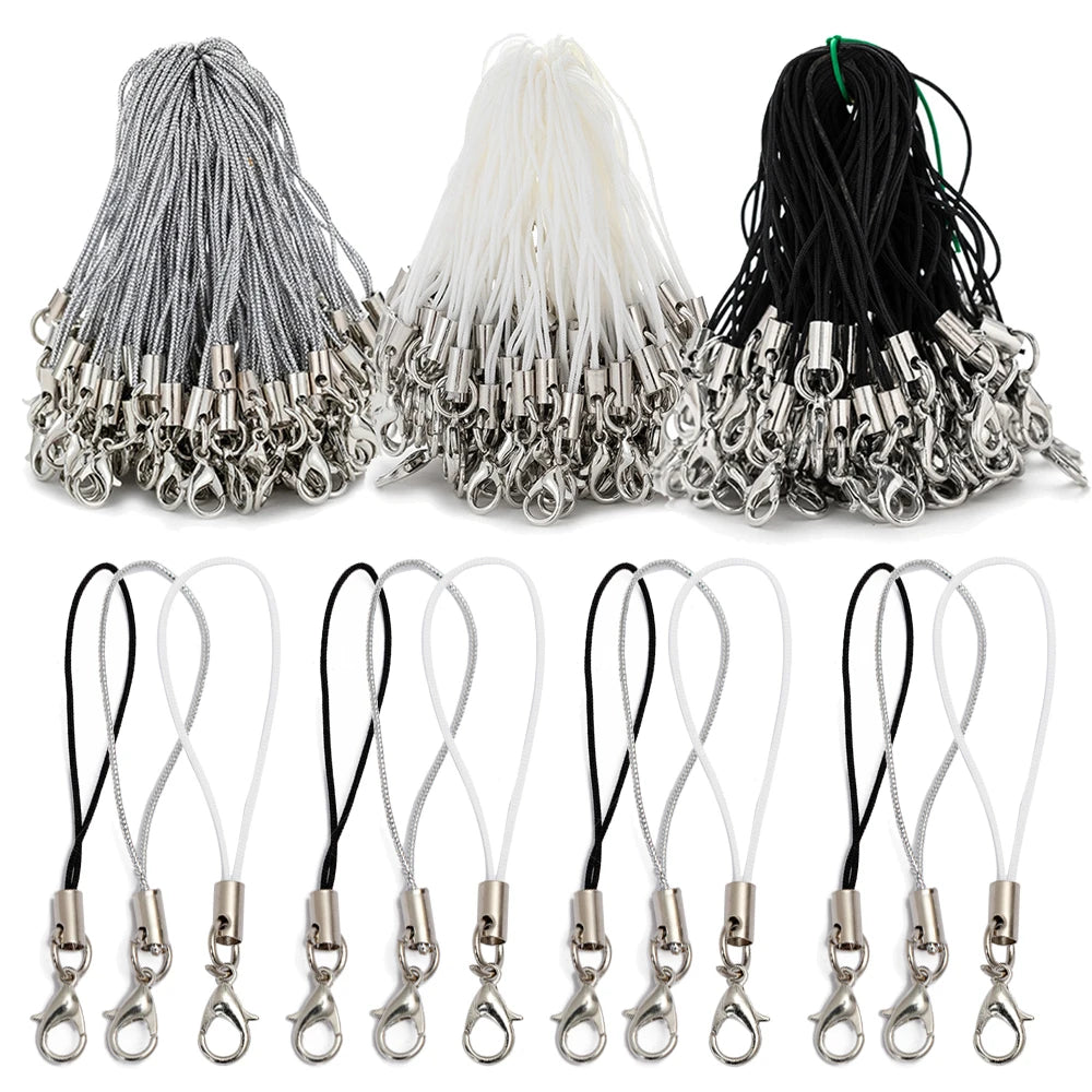 A collection of silver and black lobster clasp lanyards and straps for jewelry making