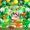 A colorful dinosaur party decoration kit featuring foil balloons, a banner, and a cake topper.