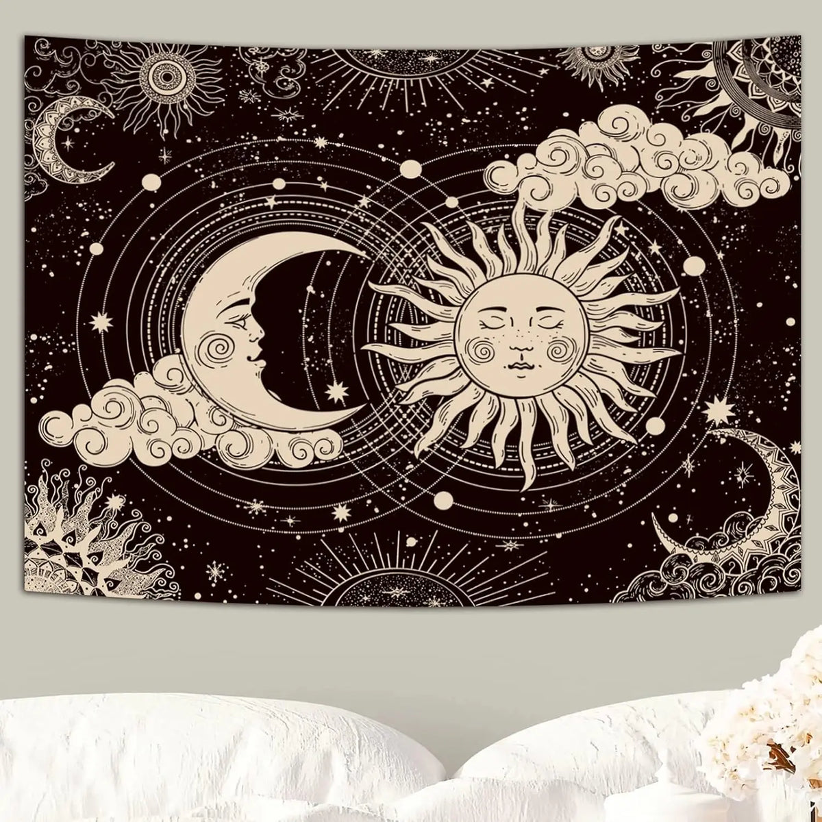 A black tapestry wall hanging featuring a celestial design with a crescent moon, sun, and clouds.