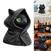 A dark gray gothic hooded cat statue with glowing green eyes, displayed in various contexts.