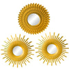 A set of three gold sunflower wall mirrors with reflective surfaces.