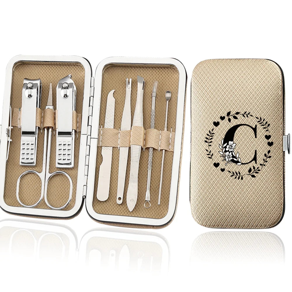 An open leather case displaying an 8-piece stainless steel manicure and pedicure kit with various tools.
