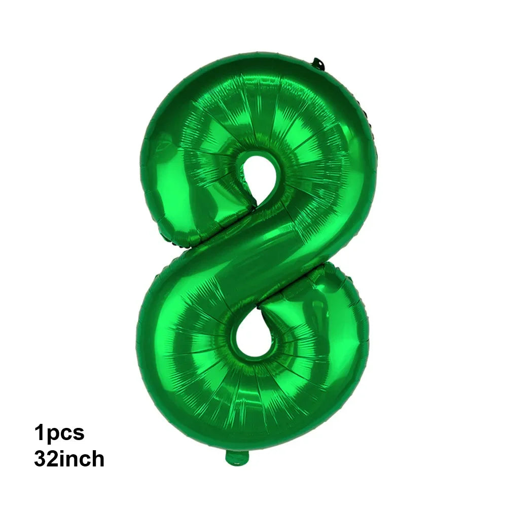 A green latex balloon shaped like the number 8 used for party decorations.