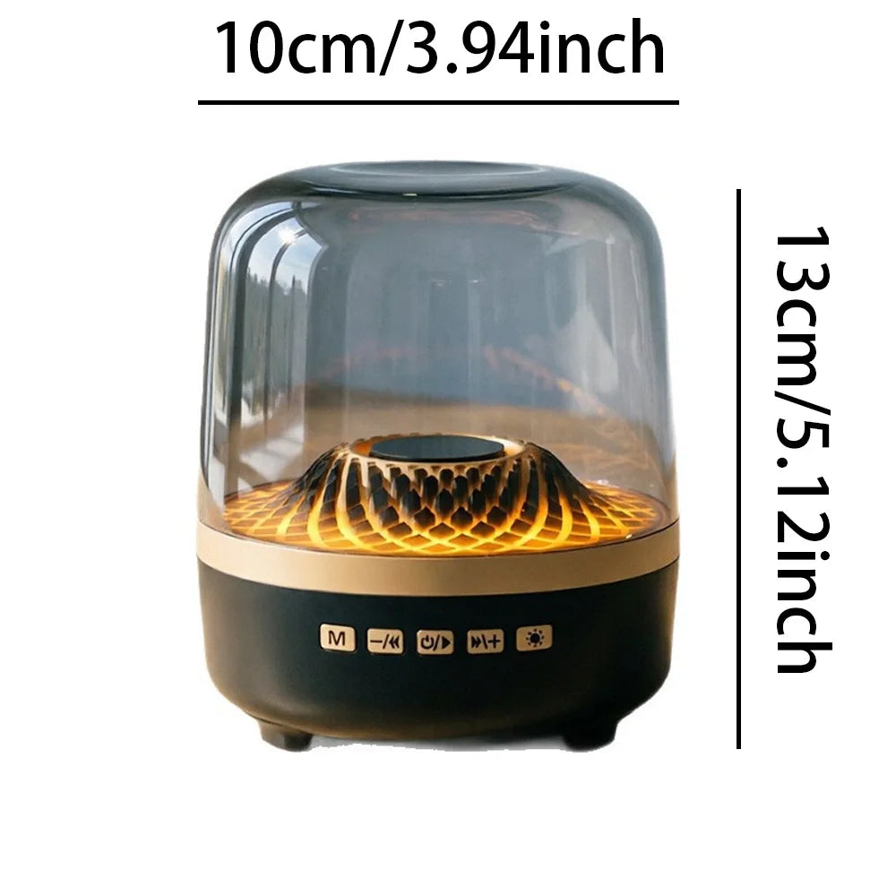 A transparent speaker with an illuminated wooden pattern sits on a dark base.