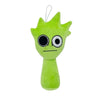 A bright lime green plush toy shaped like a spiky, stylized plant or creature.