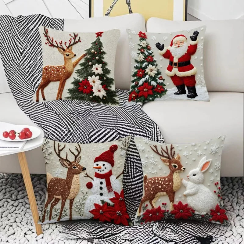 A set of four festive Christmas linen throw pillow covers featuring reindeer, Santa, and a Christmas tree design.