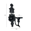 Vintage black wall-mounted double candle holder with ornate detailing