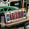 A vintage metal year wall plaque for 1968 displayed on a wooden surface.