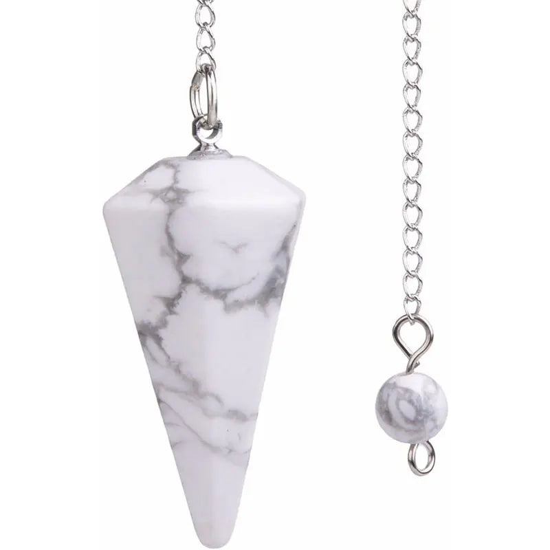 A white marble teardrop pendant on a silver chain, used for divination and energy healing.