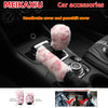 Pink leopard print car accessories including a handbrake cover, gearshift cover, and steering wheel cover.