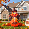 A large orange inflatable pumpkin turkey decoration placed in front of a house with autumn leaves and pumpkins.