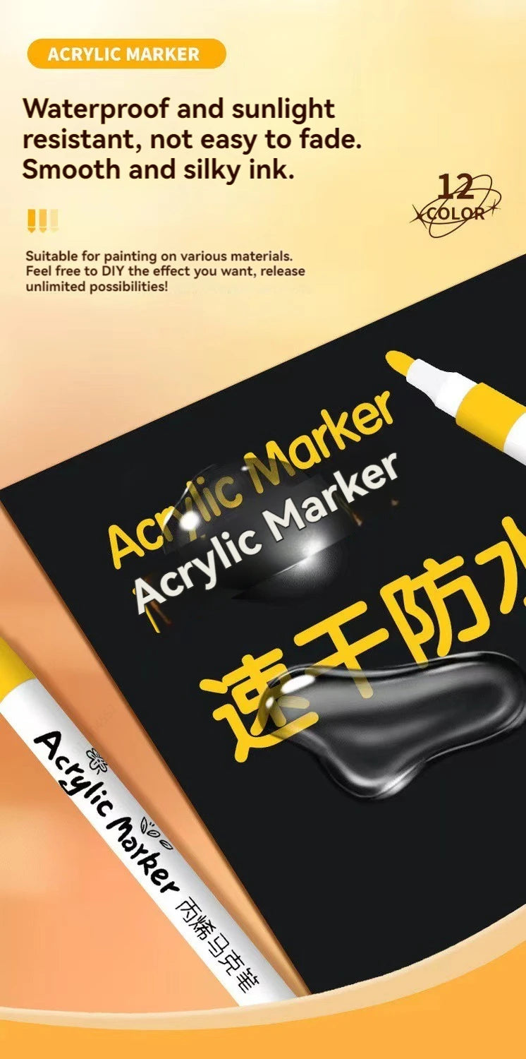A close-up of a black acrylic marker set on a dark surface with yellow text and an open packaging view.