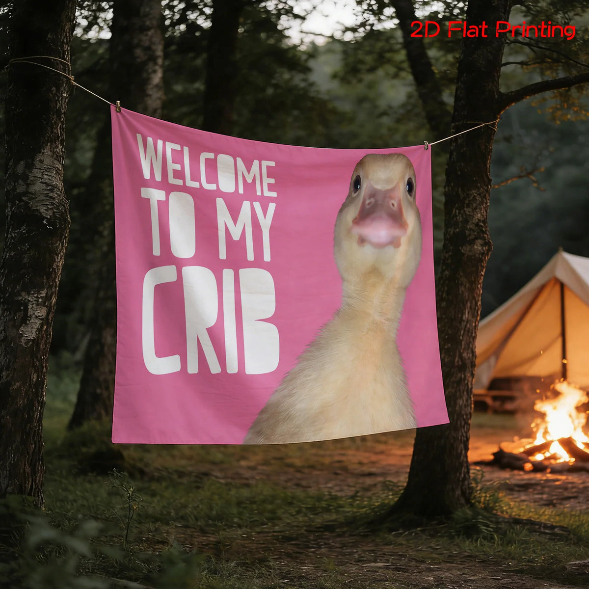 A pink tapestry with the text Welcome to my crib and a duck face design hanging between two trees.